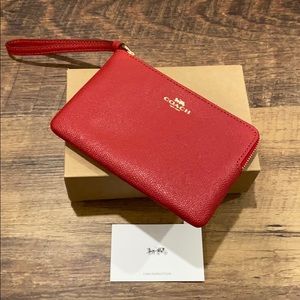 NIB Coach red wristlet with gold hardware